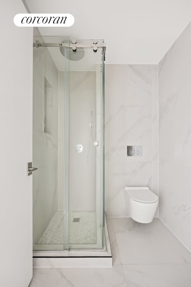 68 Eldert St Unit 3B, New York City, NY 11207 - full bath featuring a marble finish shower, toilet, and marble finish floors