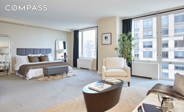 220 Riverside Blvd Unit 19Jg, New York City, NY 10069 - carpeted bedroom featuring radiator heating unit