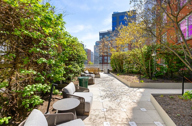20 River Ter Unit 11L, New York City, NY 10282 - view of patio featuring a city view