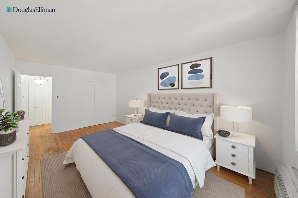 310 Lenox Rd Unit 4U, New York City, NY 11226 - bedroom featuring wood finished floors, a closet, and baseboards