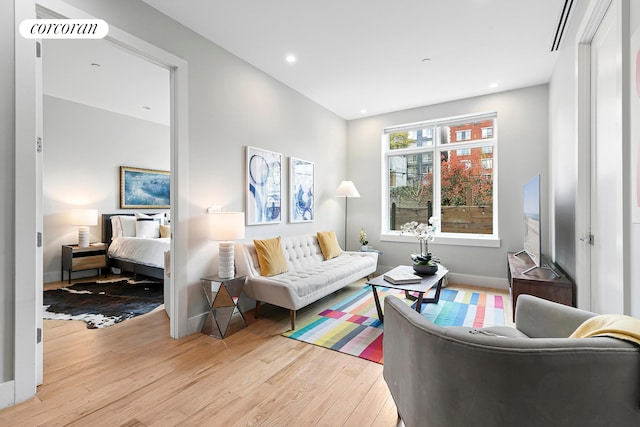 519 Maple St Unit 1B, New York City, NY 11225 - living room featuring light wood-style floors and recessed lighting