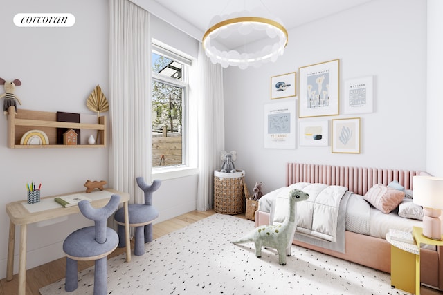 519 Maple St Unit 1B, New York City, NY 11225 - bedroom with radiator heating unit and wood finished floors