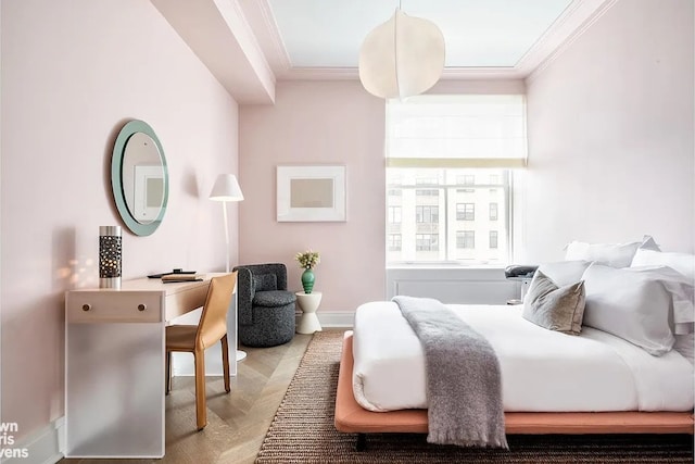 bedroom with baseboards and ornamental molding