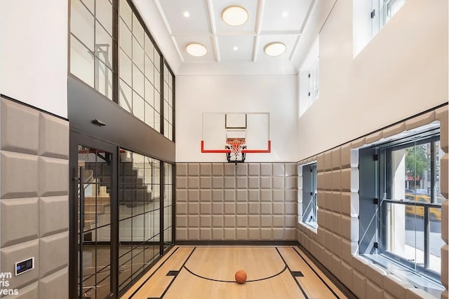 view of sport court featuring basketball hoop