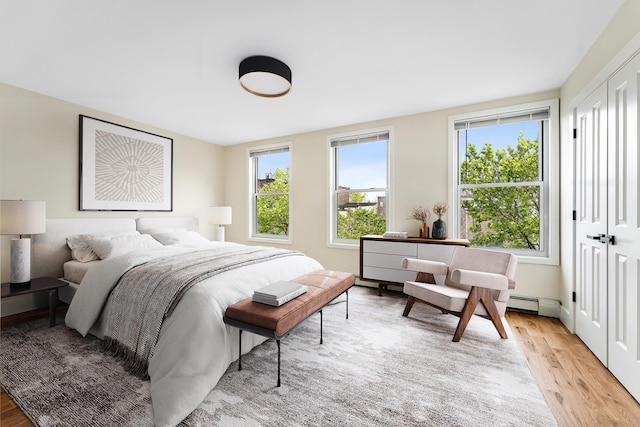 bedroom with light wood-type flooring