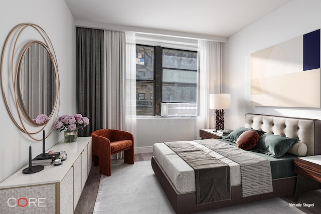 bedroom with light wood-type flooring