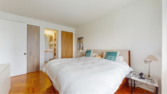 bedroom featuring ensuite bath