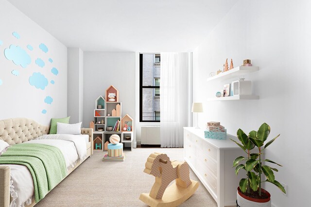 bedroom with light colored carpet