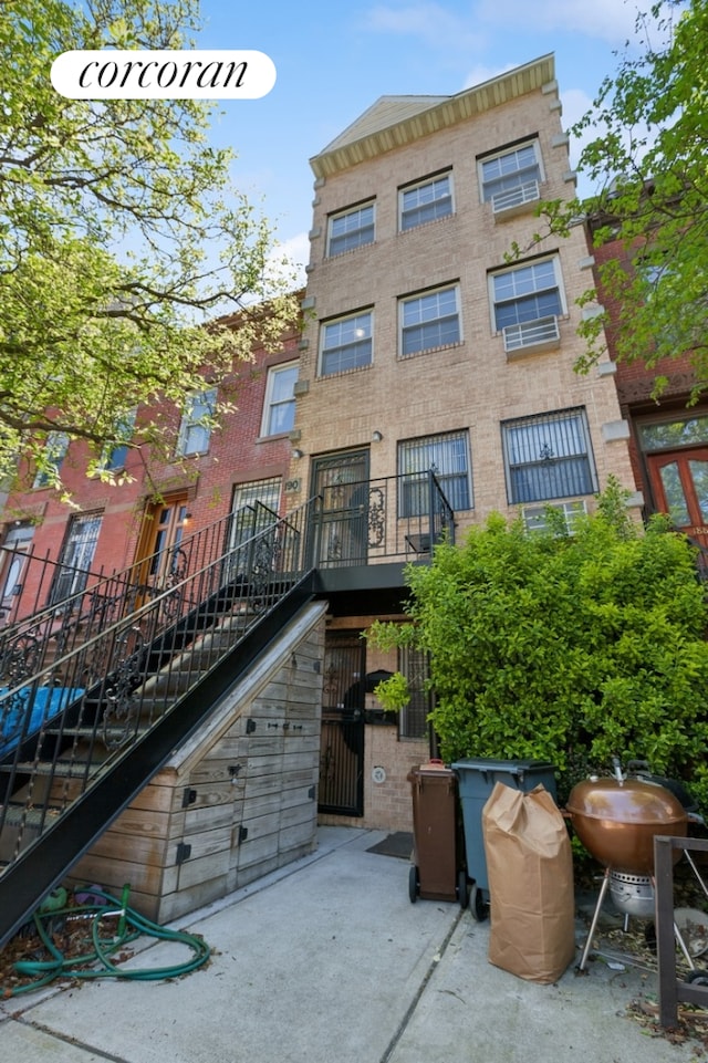 view of building exterior with stairs
