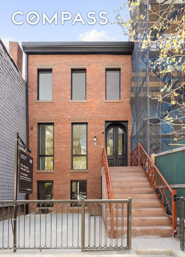 back of property with brick siding
