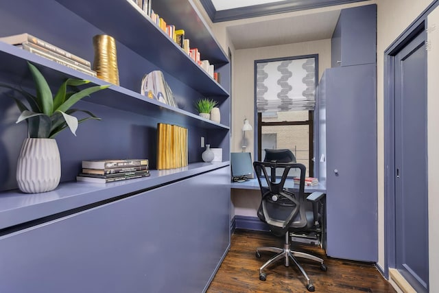 home office with built in desk and wood finished floors