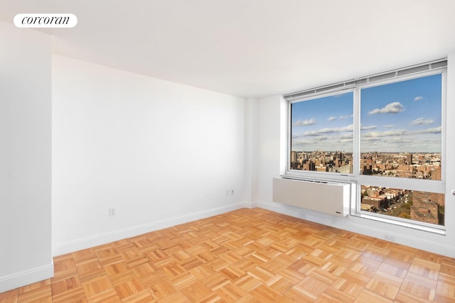 empty room with baseboards