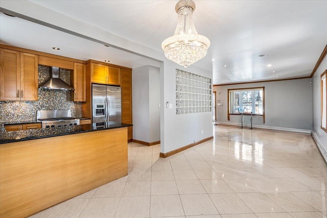 21-09 48th St, New York City, NY 11105 - kitchen with stainless steel fridge with ice dispenser, wall chimney exhaust hood, range, brown cabinets, and baseboards