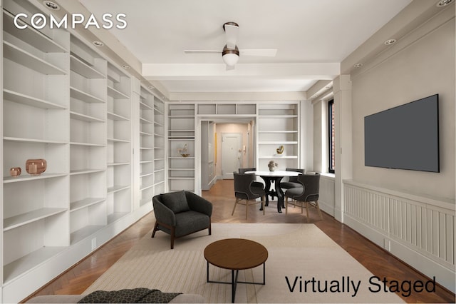 50 Park Ave Unit 15B, New York City, NY 10016 - sitting room featuring built in features and a ceiling fan