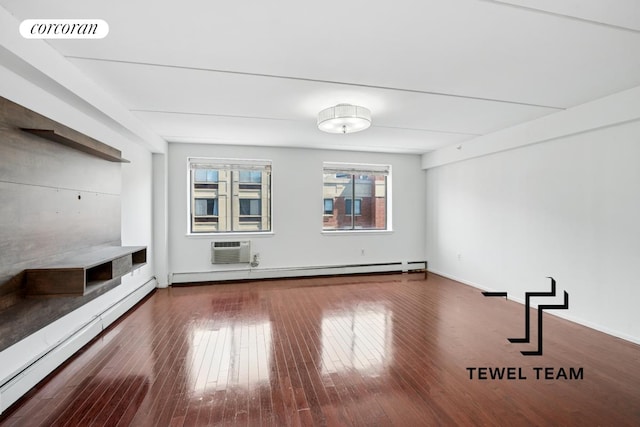 unfurnished living room with visible vents, wood-type flooring, baseboards, a wall unit AC, and a baseboard heating unit