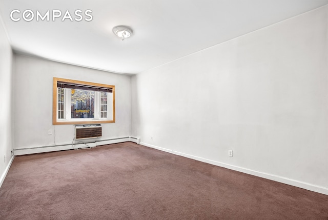 41-26 71st St Unit 1A, New York City, NY 11377 - unfurnished room with baseboard heating, dark carpet, baseboards, and an AC wall unit