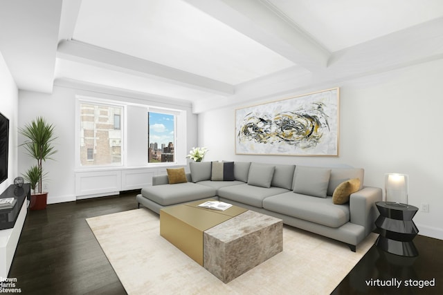 living room with baseboards, beam ceiling, and wood finished floors