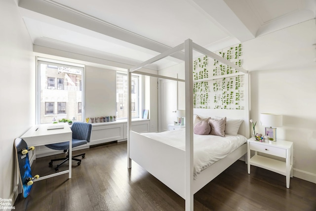 1212 5th Ave Unit 14Ad, New York City, NY 10029 - bedroom with multiple windows, dark wood-style flooring, a desk, and beamed ceiling