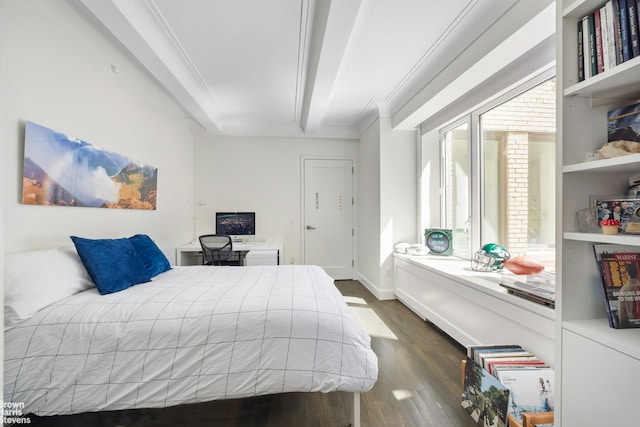 bedroom with baseboards, ornamental molding, and dark wood finished floors