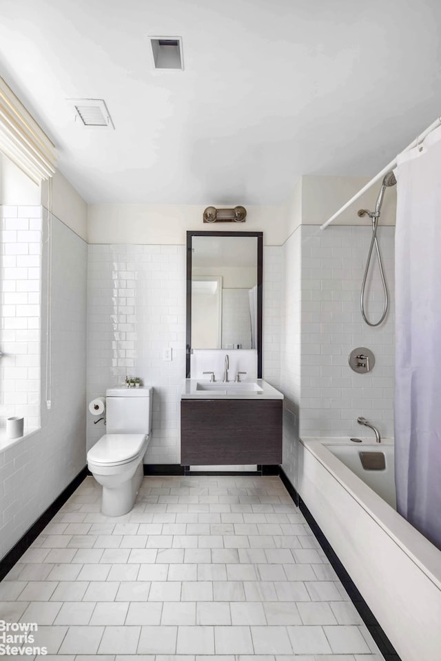 full bath with vanity, toilet, baseboards, shower / bathtub combination with curtain, and tile patterned floors