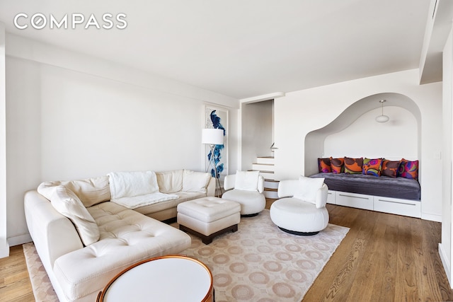 45 E End Ave Unit 6/7B, New York City, NY 10028 - living room featuring wood finished floors and stairway