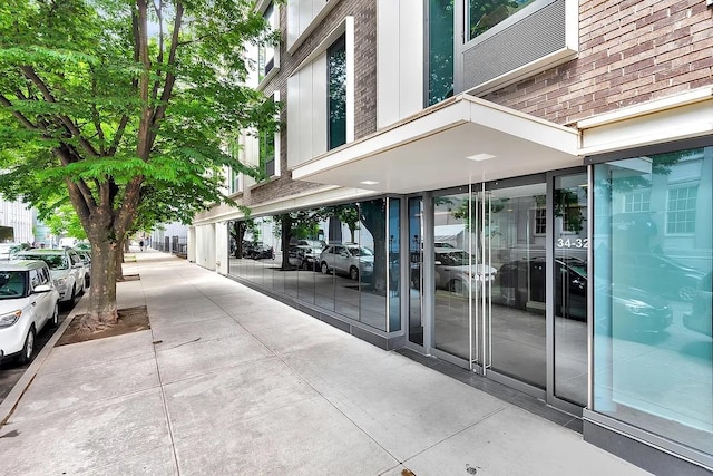 34-32 35th St Unit 3F, New York City, NY 11106 - entrance to property with brick siding