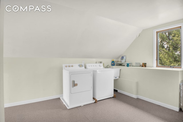 laundry room with separate washer and dryer, baseboards, laundry area, and carpet flooring