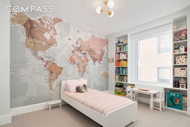 carpeted bedroom with baseboards