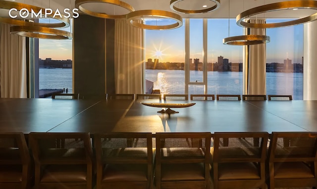 10 Riverside Blvd Unit 28C, New York City, NY 10069 - dining space with a water view, expansive windows, and a view of city