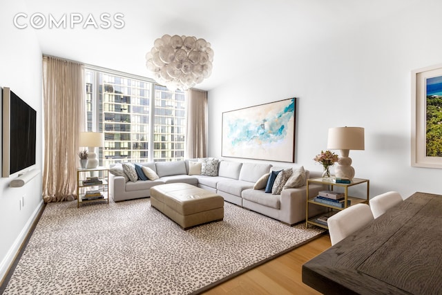 10 Riverside Blvd Unit 28C, New York City, NY 10069 - living room featuring wood finished floors
