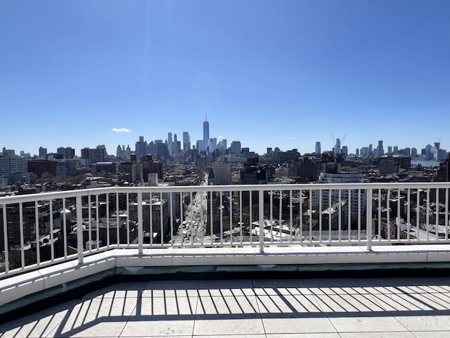 balcony featuring a city view