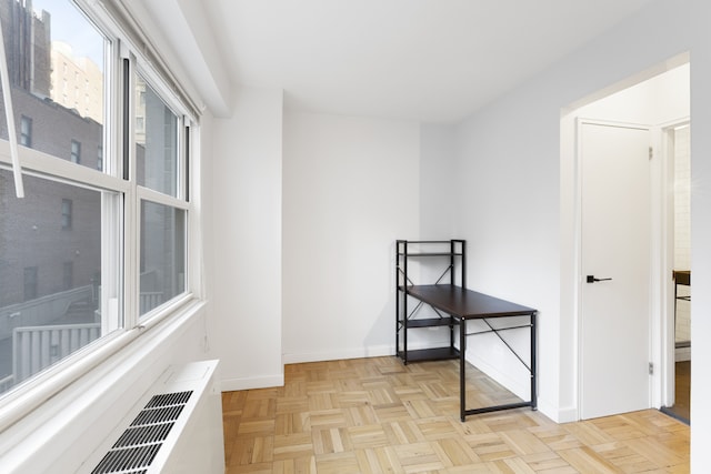 interior space featuring baseboards