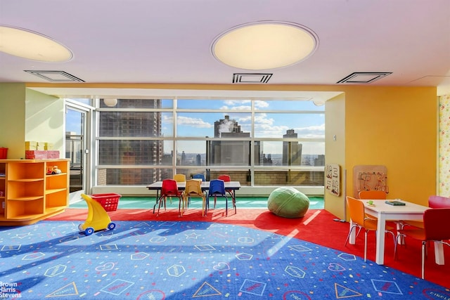 game room with visible vents