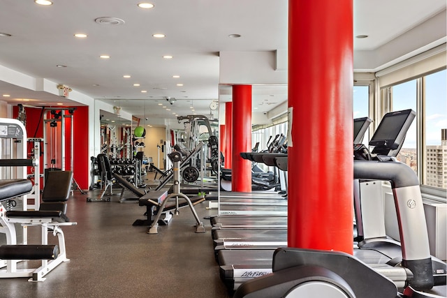 gym featuring recessed lighting