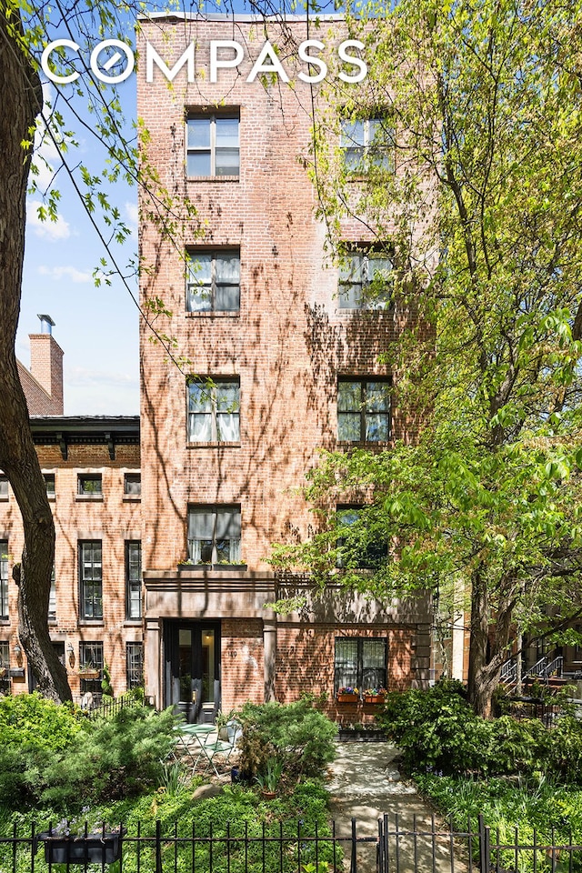 149 Lafayette Ave Unit 2A, New York City, NY 11238 - view of apartment building / complex with a fenced front yard