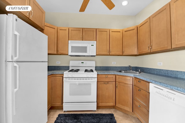 kitchen featuring white appliances, a ceiling fan, recessed lighting, and a sink