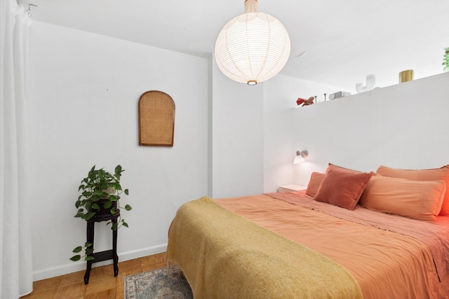 305 E 24th St Unit 4L, New York City, NY 10010 - bedroom featuring baseboards