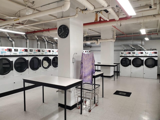 305 E 24th St Unit 4L, New York City, NY 10010 - basement featuring washer and dryer and tile patterned floors