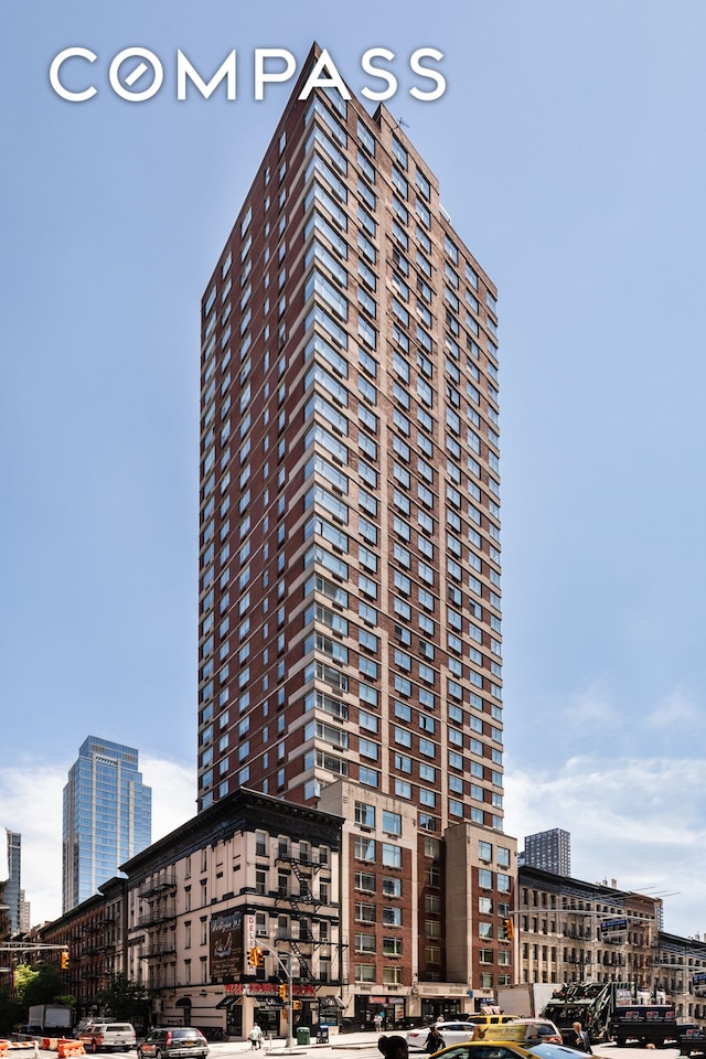view of building exterior featuring a city view