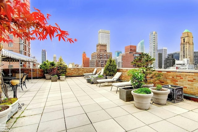 view of patio featuring a view of city