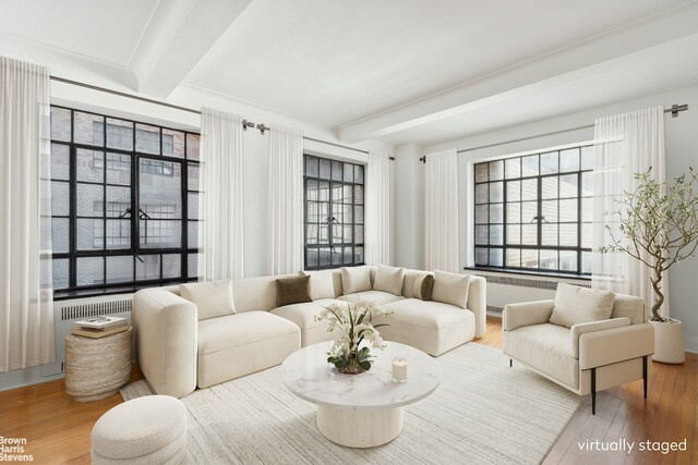 10 Park Ave Unit 5L, New York City, NY 10016 - living area with beam ceiling and wood finished floors