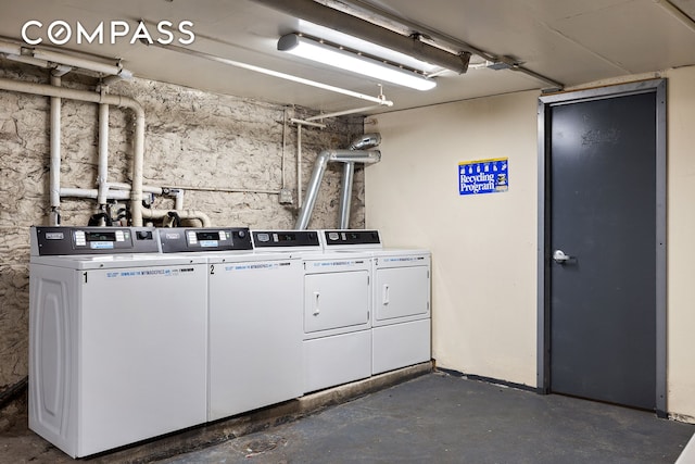 community laundry room featuring separate washer and dryer