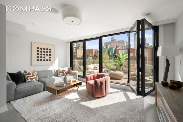 tiled living area with a view of city and floor to ceiling windows