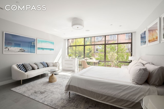 bedroom featuring baseboards