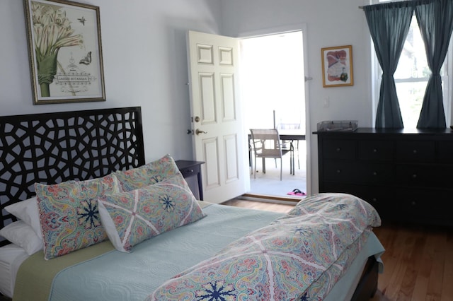 bedroom featuring wood finished floors