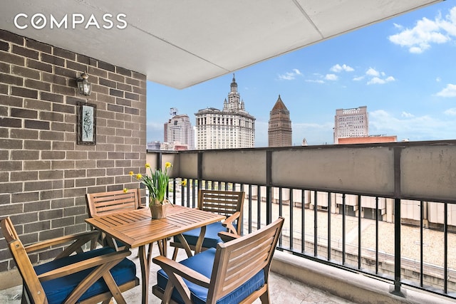 balcony featuring a view of city