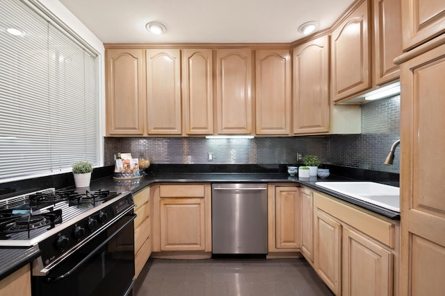 kitchen featuring a sink, dishwasher, gas stove, and light brown cabinets