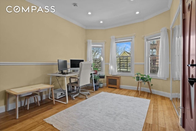 office area featuring baseboards, ornamental molding, wood finished floors, and radiator heating unit