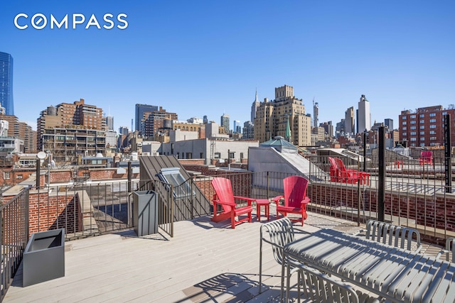deck featuring a view of city