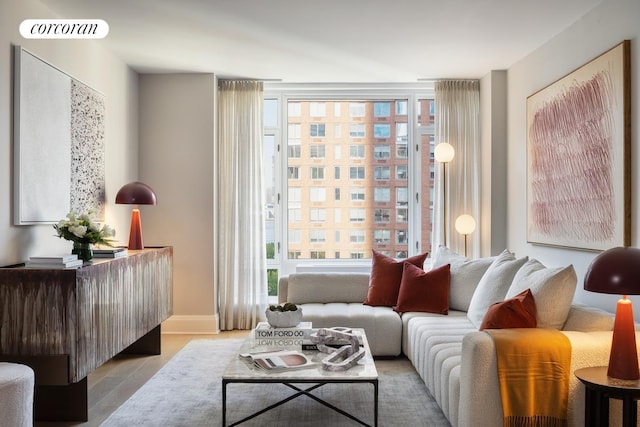 210 Warren St Unit 7A, New York City, NY 10282 - living area featuring wood finished floors